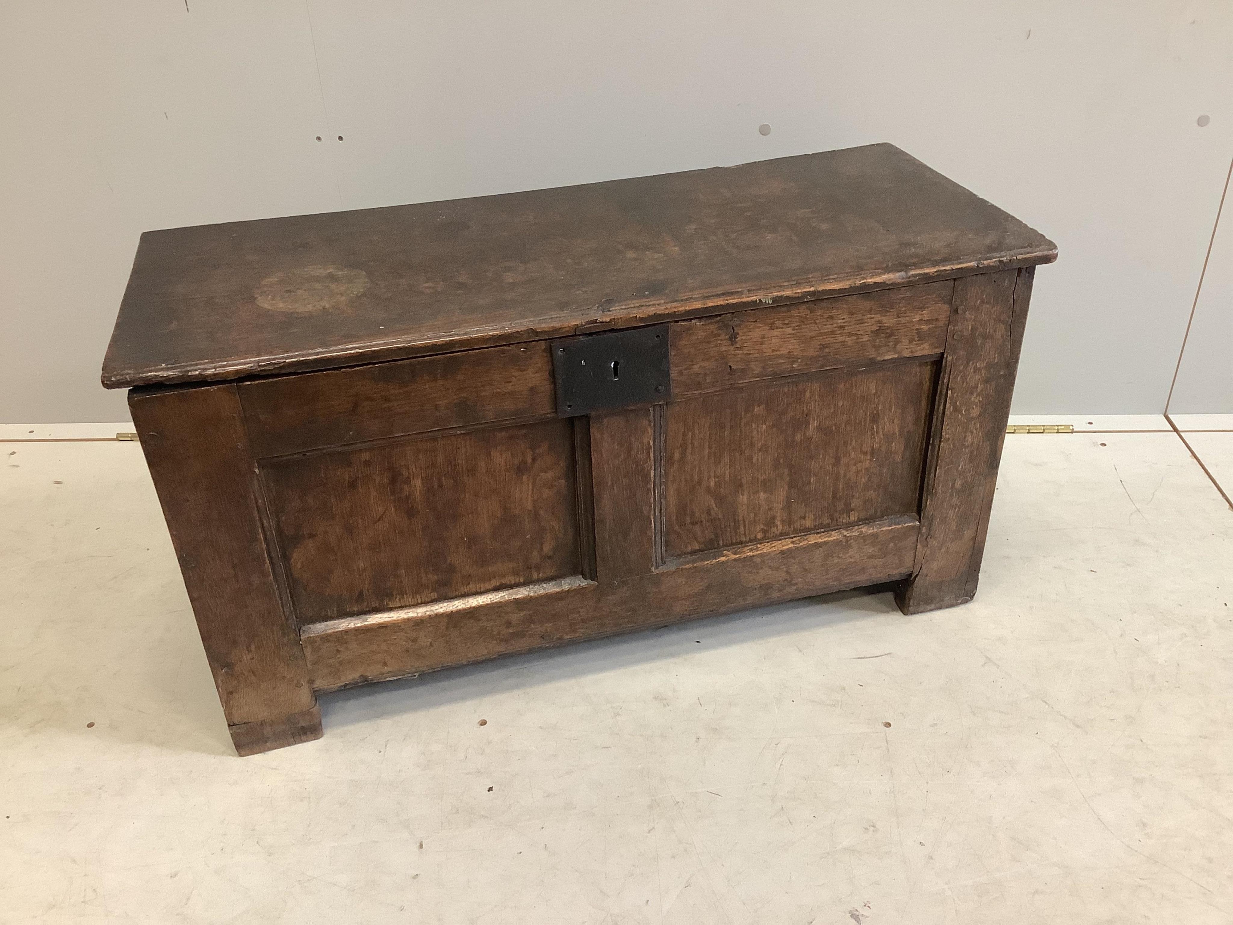 A small early 18th century panelled oak coffer, width 90cm, depth 36cm, height 47cm. Condition - fair